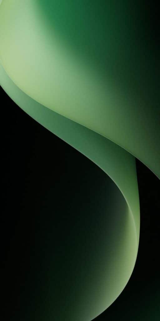 Abstract green gradient swirl on dark background, creating a smooth, flowing pattern.