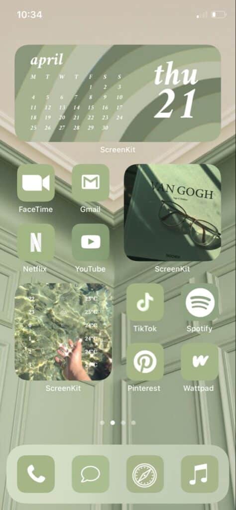Aesthetic iPhone home screen with app icons, calendar, and book cover in green theme.