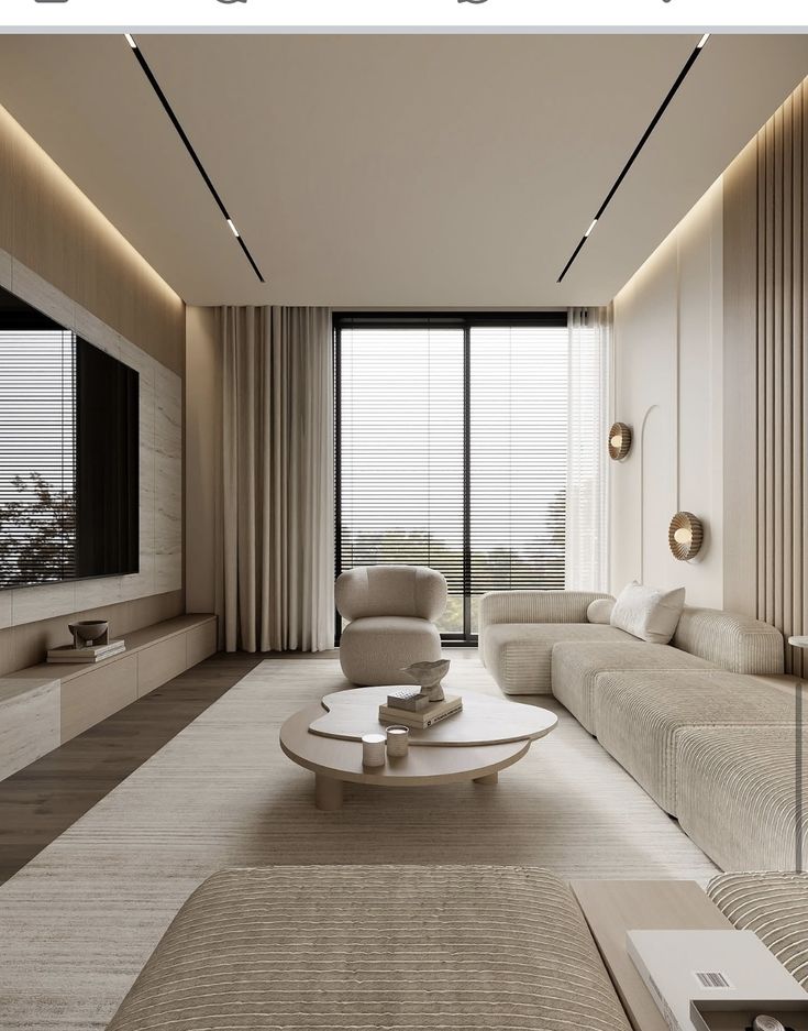Modern living room with beige furniture, large windows, and sleek decor. Minimalist design with neutral tones.