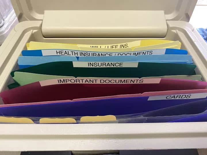 Organized file box with labeled folders: Will, Insurance, Important Documents, and Cards for efficient document storage.