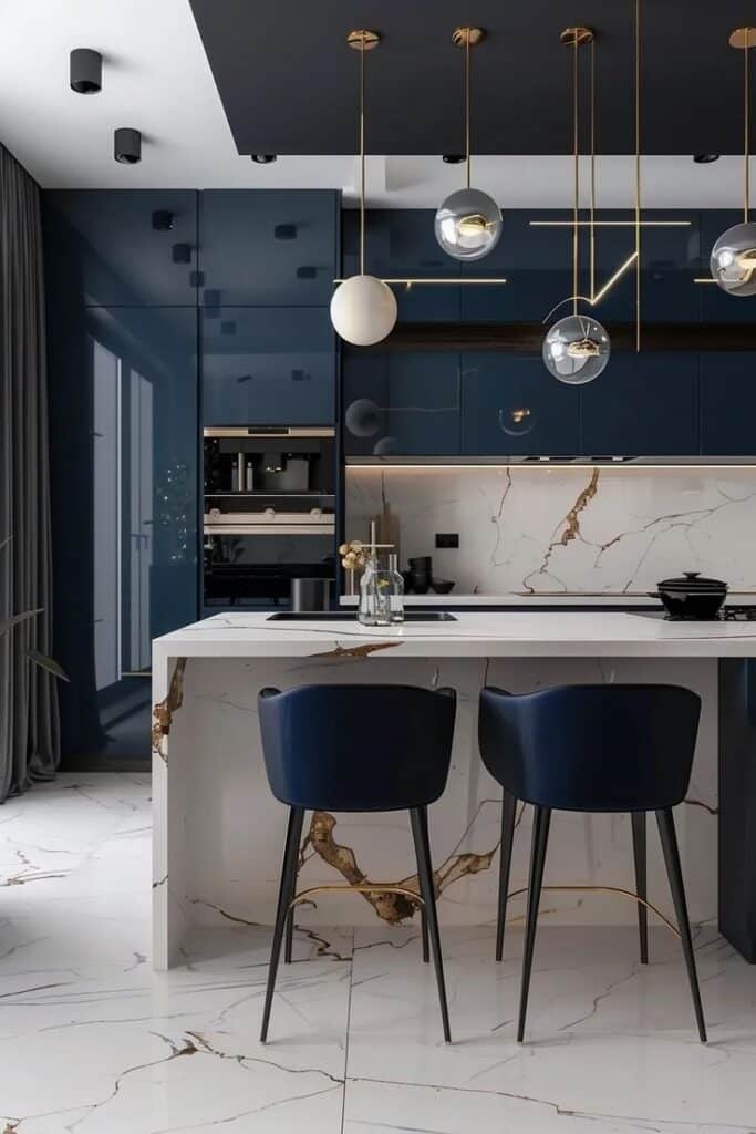 Luxury modern kitchen with navy cabinets, marble island, and pendant lights. Sleek and elegant design.