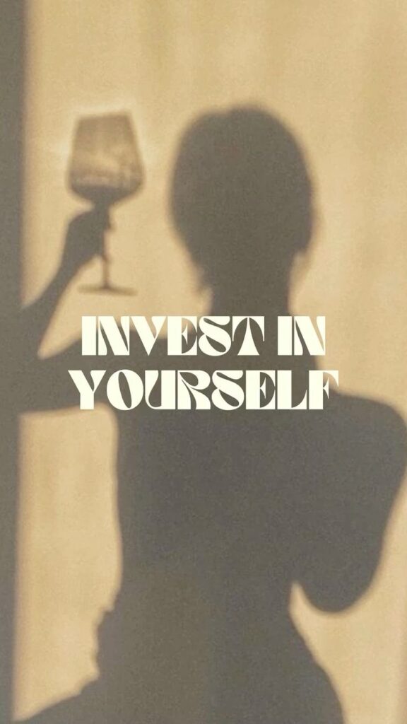 Shadow of a person holding a glass, with text Invest in Yourself overlaying. Motivational and self-care concept.