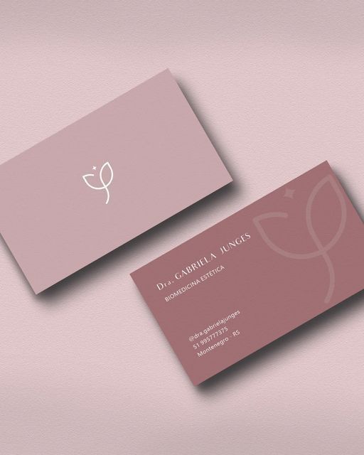 Sophisticated business card design in soft pink for Dr. Gabriela Junges, Aesthetic Biomedicine professional.