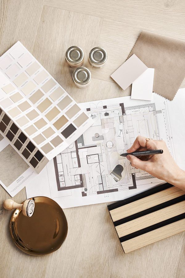 Interior design planning with floor plan, color swatches, paint samples, and fabric. Hand drawing on blueprint. Elegant Bathroom Interior
