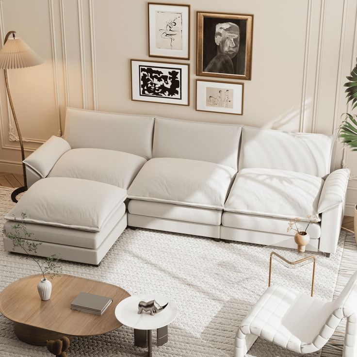 Modern living room with beige sectional sofa, stylish coffee table, and wall art in a bright, inviting space.
