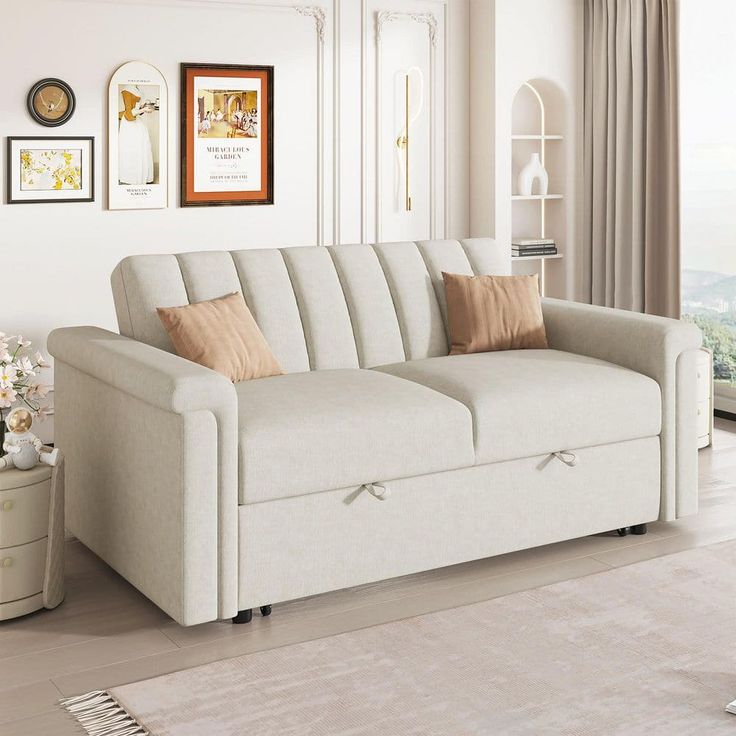 Modern beige sofa with plush cushions in a stylish living room, featuring wall art and warm neutral tones.