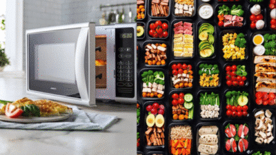 Microwave with a plate of food and an assortment of colorful meal prep boxes, showcasing convenient cooking options.