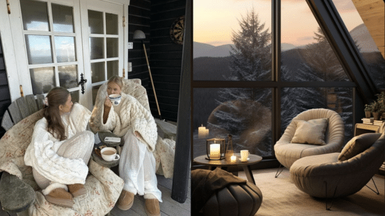 Viewing Deck Blog Cozy winter retreat: two women in knitwear on a porch with hot drinks; scenic mountain sunset through cabin windows. | Sky Rye Design Cozy winter retreat: two women in knitwear on a porch with hot drinks; scenic mountain sunset through cabin windows.