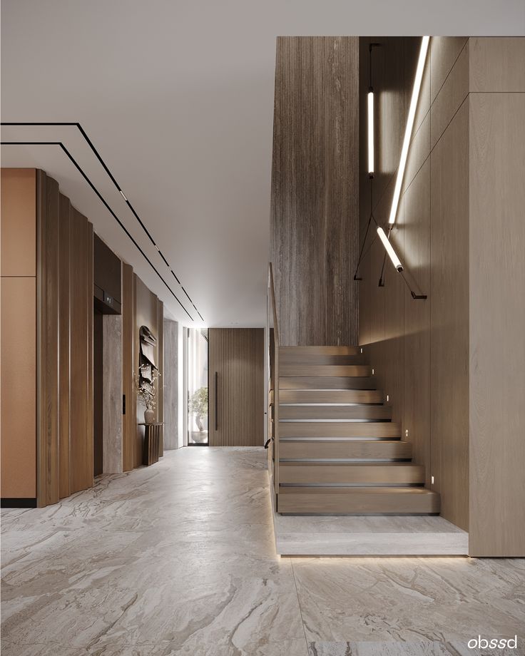 Modern interior with a wooden staircase, marble floor, and minimalist lighting in a contemporary hallway.