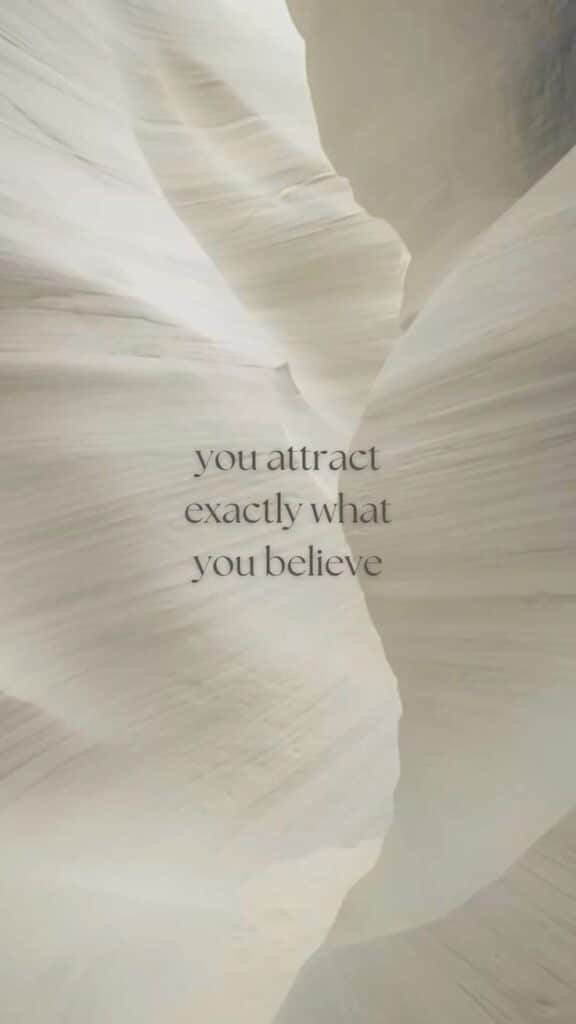 Inspirational quote on a textured, flowing background: You attract exactly what you believe.