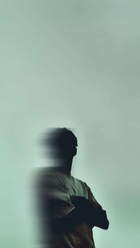 b461835b28467699f1f95c7dcba209df Blurred silhouette against green background, depicting motion and mystery. | Sky Rye Design Blurred silhouette against green background, depicting motion and mystery.