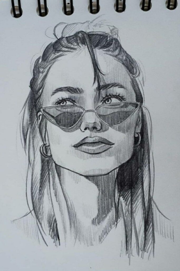 Pencil sketch of a woman wearing sunglasses, looking upward with hair tied back, detailed shading and expression.