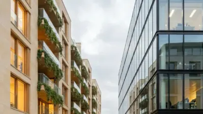 Pedestrian-friendly mixed-use urban plaza with glass office tower and residential building featuring green balconies, people walking.