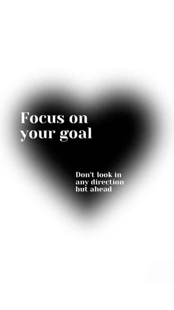 Heart-shaped gradient with motivational text: Focus on your goal. Don't look in any direction but ahead.