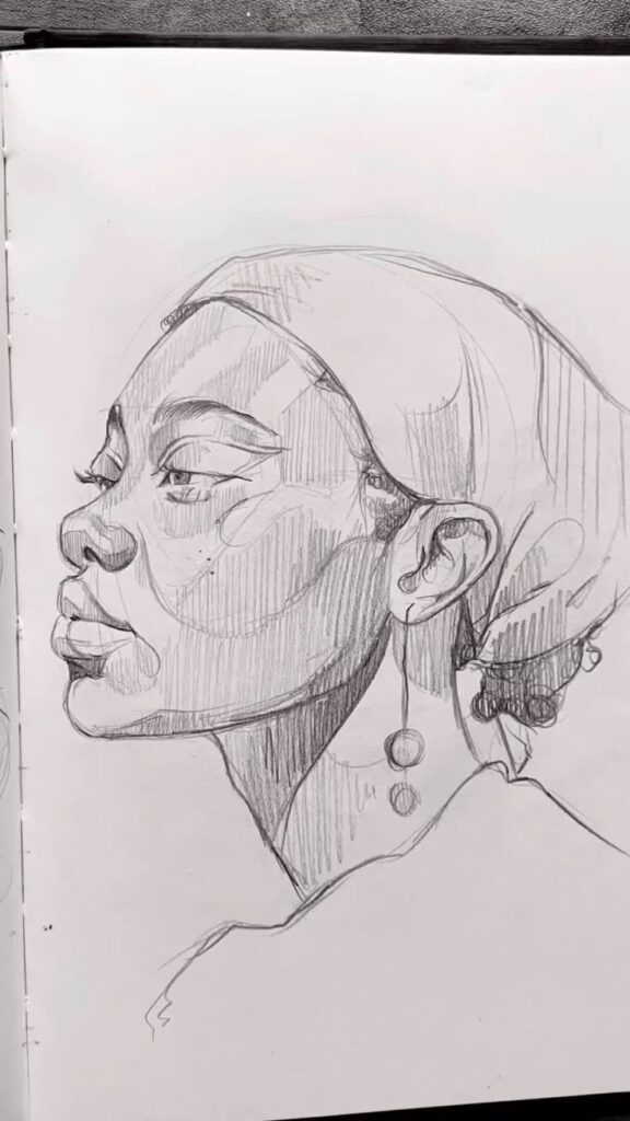 Pencil sketch of a woman in profile with earrings, wearing a headscarf, showcasing detailed shading and texture.