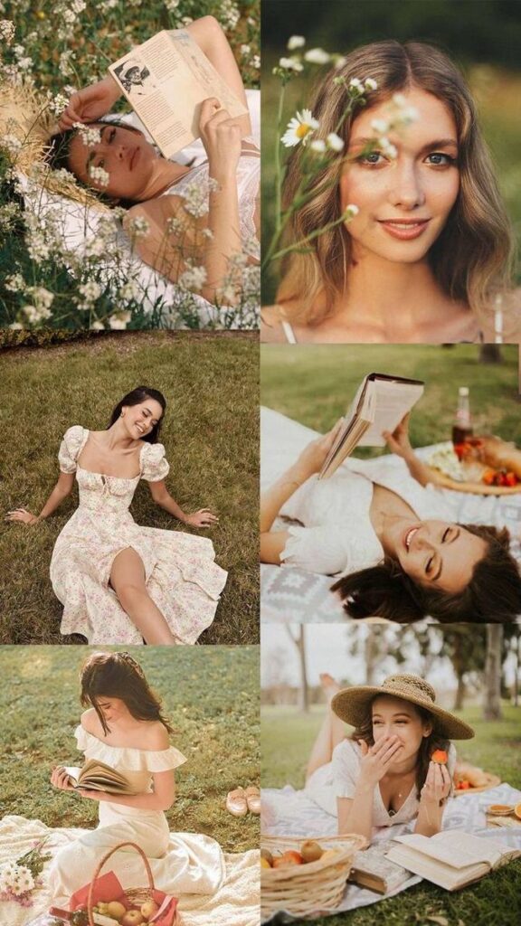 Women enjoying a sunny picnic in floral dresses, reading and relaxing on the grass with books and strawberries.