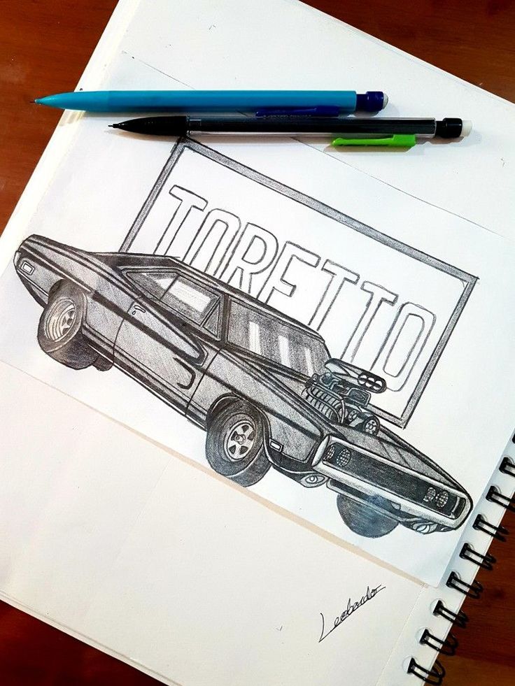 Pencil sketch of a muscle car with Toretto sign, showcasing automotive art on a sketchpad with pens.
