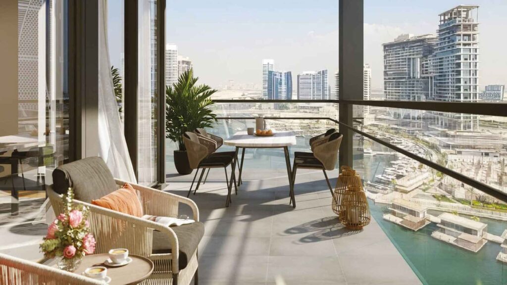 one-river-point-apartments-01 Luxury balcony with city and marina view, featuring outdoor seating and a dining table with decorative plants. | Sky Rye Design Luxury balcony with city and marina view, featuring outdoor seating and a dining table with decorative plants.
