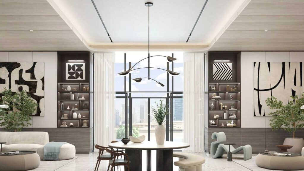 Modern living room with abstract art, elegant furniture, and large windows overlooking a cityscape.