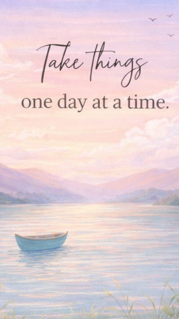 Serene pastel lake sunset with lone rowboat and motivational quote Take things one day at a time.