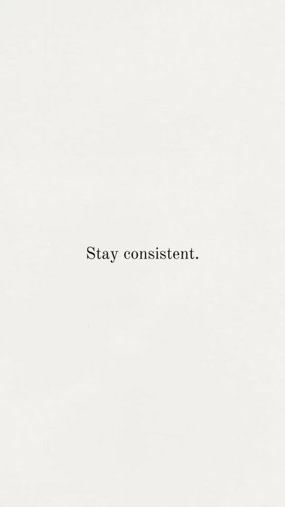 Text message on a white background saying Stay consistent promotes motivation and perseverance.