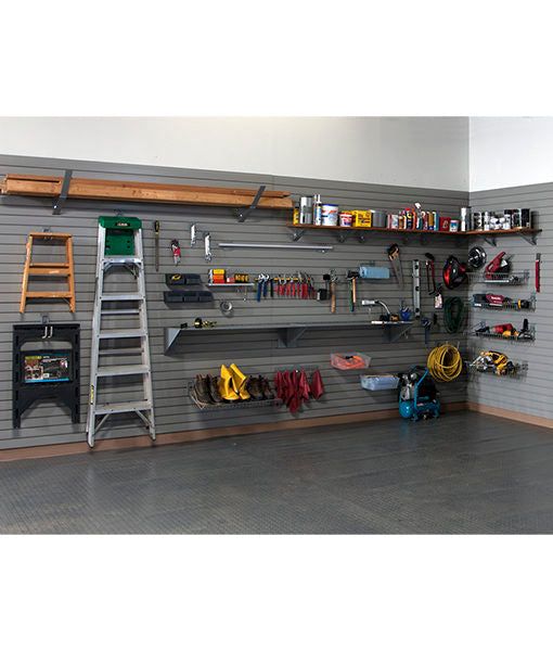 Organized garage wall with various tools, ladder, and shelves for efficient storage and easy access.