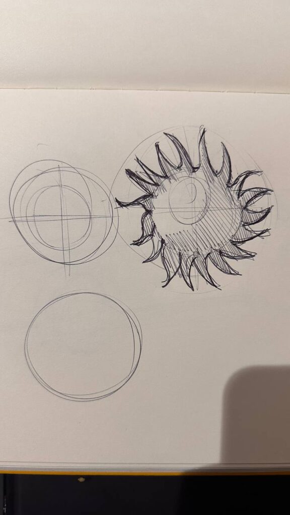 Hand-drawn sunburst sketch and circle construction studies in a sketchbook, pen and pencil drawing.