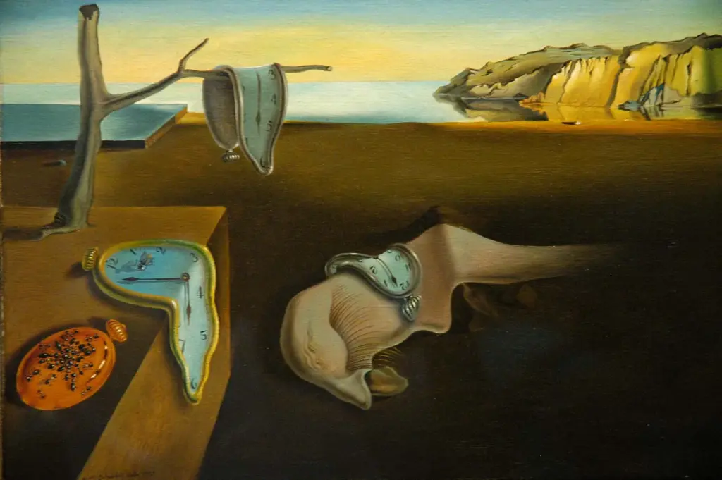 Salvador Dali surreal painting of melting clocks draped over a tree, table, and distorted face by cliffs at sunset