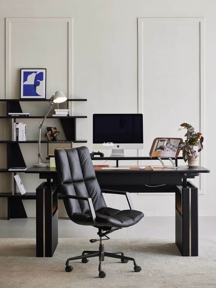 酷黑智能升降桌质感拉满 Modern home office with ergonomic chair, sleek desk, computer, and shelves. Stylish and functional workspace design. | Sky Rye Design Modern home office with ergonomic chair, sleek desk, computer, and shelves. Stylish and functional workspace design.