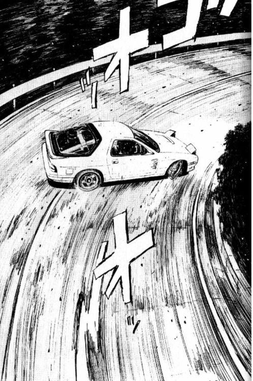 Manga-style car drifting on a curved mountain road, with dynamic motion lines and Japanese sound effects.
