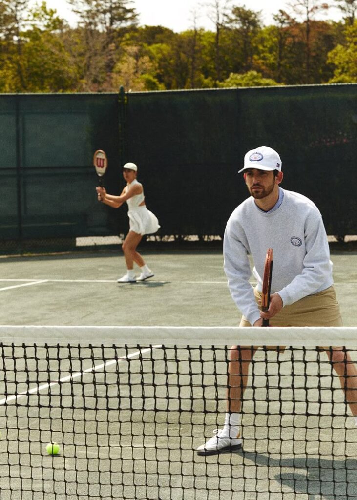 07608563fb77a7c59a07d15c15efb359 Two tennis players on a court, focusing on the match, ready to hit the ball over the net. | Sky Rye Design Two tennis players on a court, focusing on the match, ready to hit the ball over the net.