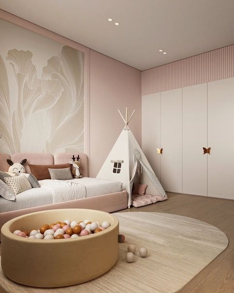 10 Gorgeous Girls Bedroom Designs to Inspire Your Childs Room Makeover Child's room with pastel decor: teepee tent, bed with plush toys, wall art, ball pit, and butterfly accents on closet. | Sky Rye Design Child's room with pastel decor: teepee tent, bed with plush toys, wall art, ball pit, and butterfly accents on closet.