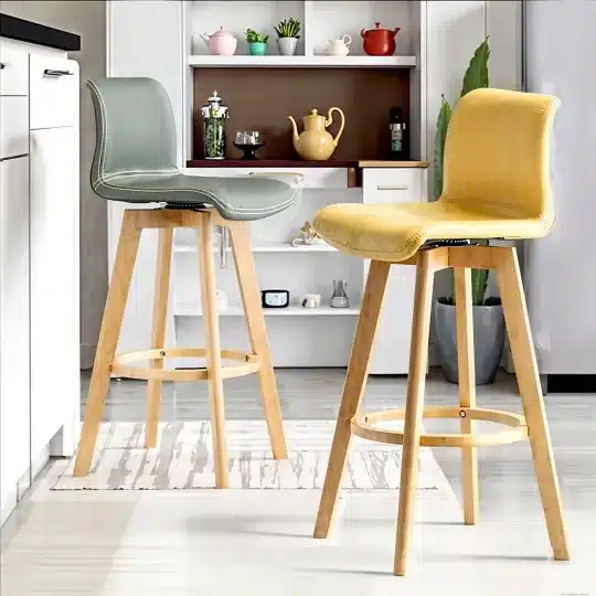 10524004_540x Modern kitchen with stylish bar stools, light wood legs, and colorful seats. Contemporary decor and shelving in the background. | Sky Rye Design Modern kitchen with stylish bar stools, light wood legs, and colorful seats. Contemporary decor and shelving in the background.