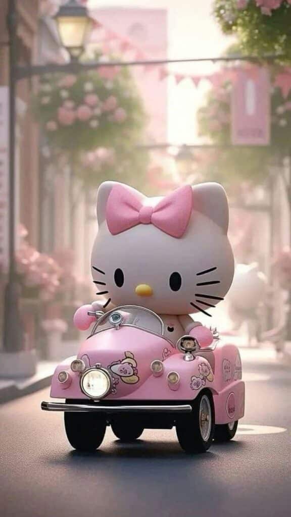 Cute cartoon cat character driving a pink toy car on a whimsical street with flowers.