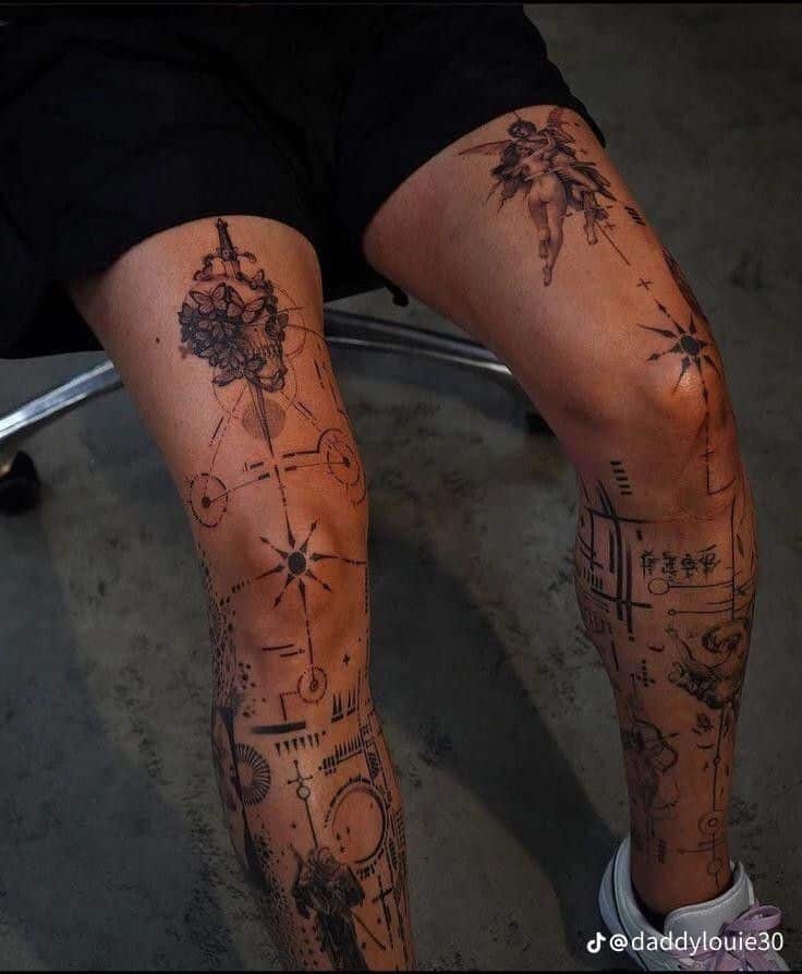 Intricate leg tattoos featuring geometric designs and mythical characters on both thighs.