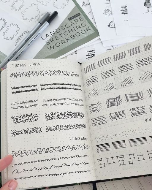 Open sketchbook with basic line exercises for landscape drawing, featuring various patterns and pen sketches.