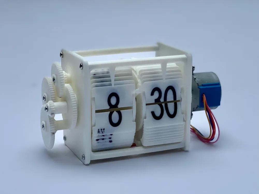 Mechanical flip clock displaying 8:30 with visible gears and motor; vintage and modern design blend.