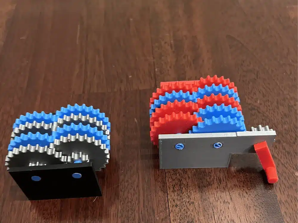 Colorful interlocking gears on a wooden surface, showcasing mechanical design and engineering concepts.
