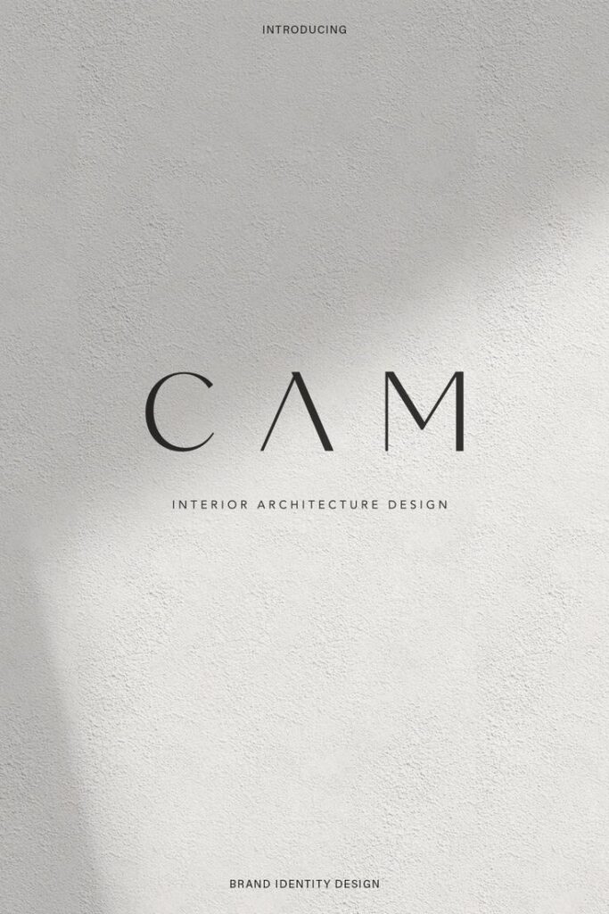 Modern minimalist interior architecture design branding on textured white background.