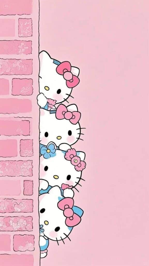 Cute cartoon cats with pink and blue bows peeking behind a pink brick wall on a pastel background.