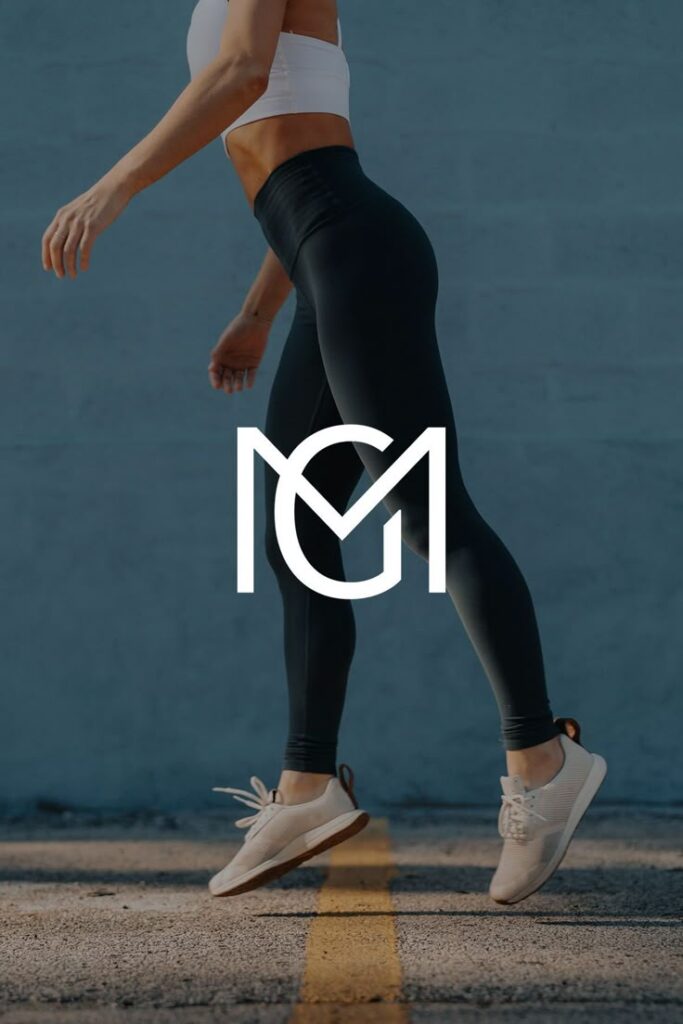 Athletic woman walking in workout attire with modern logo overlay, emphasizing fitness and active lifestyle.