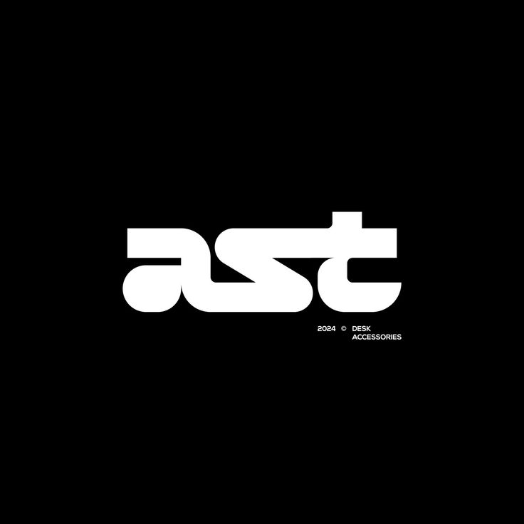 Bold 'ast' logo for 2024 desk accessories on a black background.