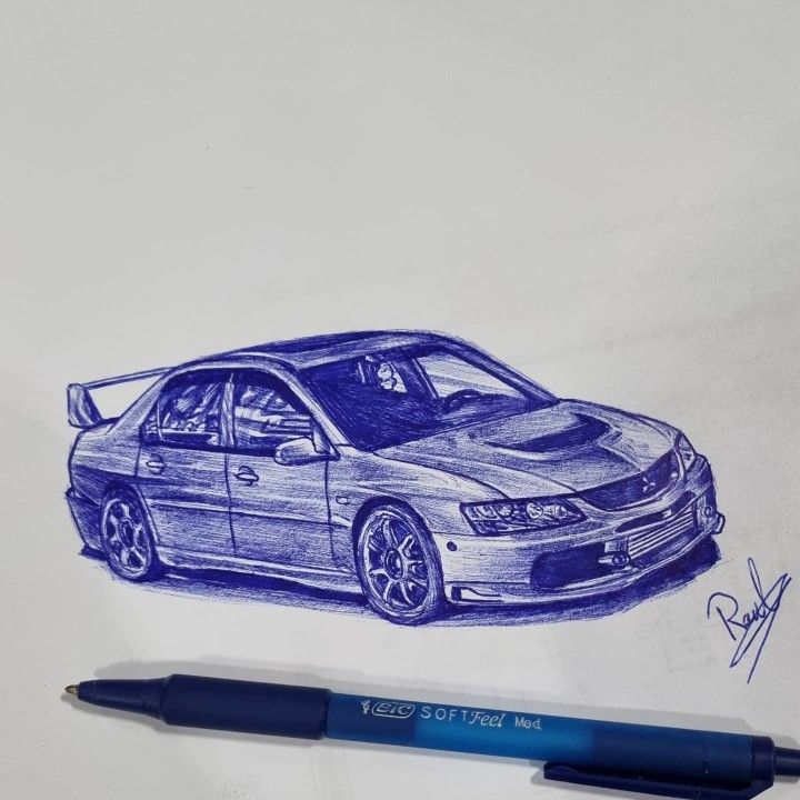 Blue ink drawing of a sports car with a pen beside it on paper. Detailed sketch, includes a rear spoiler and signature.