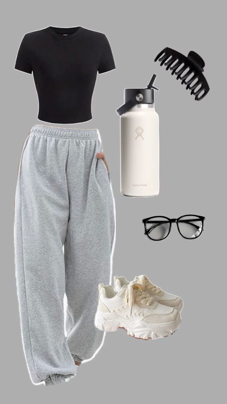 Casual outfit with black tee, gray joggers, chunky sneakers, water bottle, glasses, and hair clip on gray background.