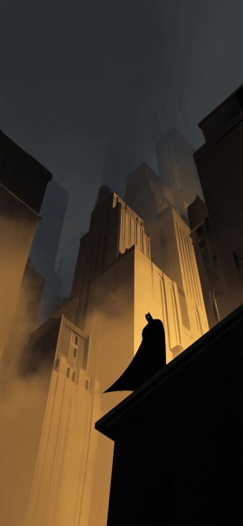 _ 5 Dark silhouette of a caped figure standing on a rooftop against towering cityscape at dusk. | Sky Rye Design Dark silhouette of a caped figure standing on a rooftop against towering cityscape at dusk.