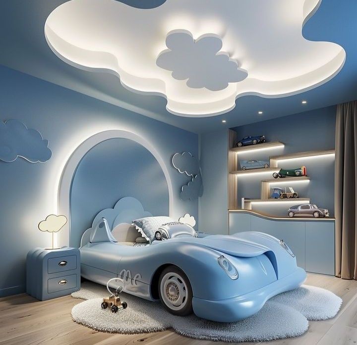 Sky-themed children's room with a blue car bed, cloud ceiling lights, and decorative shelves.
