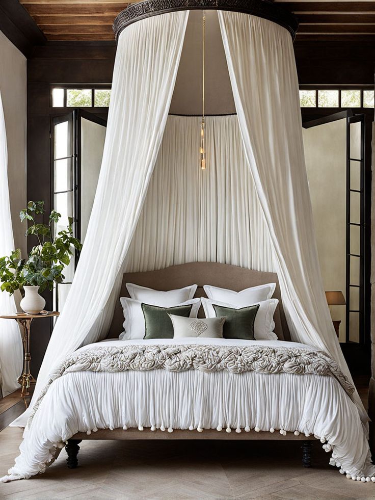 Elegant bedroom with a canopy bed, white drapes, plush bedding, and decorative pillows for a luxurious interior.