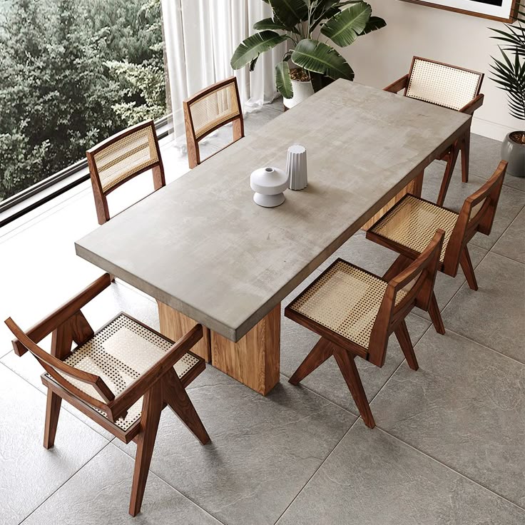 78_7_ Rectangle Dining Table Solid Wood for 6 Farmhouse Style Natural Dining Room Table Modern dining room with wooden chairs and concrete table, set by a window with greenery outside. | Sky Rye Design Modern dining room with wooden chairs and concrete table, set by a window with greenery outside.
