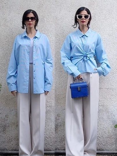 Fashion style hack: Blue shirt worn differently for chic look with a small blue handbag and beige pants.