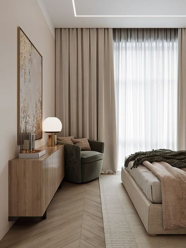 Minimalist bedroom with modern decor, featuring a cozy bed, elegant sideboard, and natural light through sheer curtains.